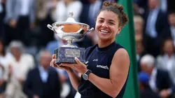 Jasmine Paolini of Italy poses for a photo with the trophy following victory against Coco Gauff of United States in the the Women's Singles Final match on Day Thirteen of Internazionali BNL D'Italia 2025.