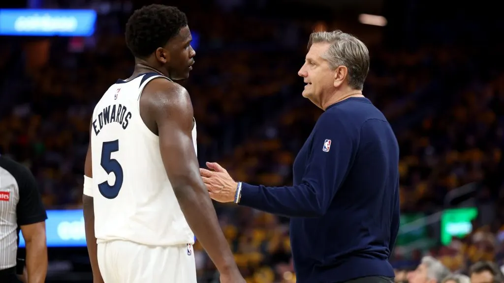 Anthony Edwards of the Minnesota Timberwolves speaks with head coach Chris Finch during a game against the Golden State Warriors on May 12, 2025