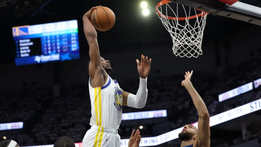 Jonathan Kuminga #00 of the Golden State Warriors dunks the ball against Rudy Gobert #27 of the Minnesota Timberwolves during the Western Conference Semifinals. (Ellen Schmidt/Getty Images)