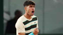 Carlos Alcaraz of Spain celebrates a point against Damir Dzumhur of Bosnia and Herzegovina during the third round of Roland Garros.