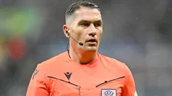 Referee Istvan Kovacs looks on during the UEFA Champions League match between Newcastle United FC and Paris Saint-Germain at St. James Park on October 04, 2023.