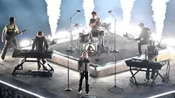 Emily Armstrong performs with Mike Shinoda, Singer of Linkin Park, Brad Delson, Lead Guitarist of Linkin Park and Dave Pharrell, Bass Player of Linkin Park during the pre match ceremony prior to the UEFA Champions League Final 2025.