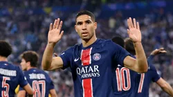 Achraf Hakimi of Paris Saint-Germain holds his hands up the FC Internazionale fans as he celebrates scoring his team's first goal during the UEFA Champions League Final 2025 between Paris Saint-Germain and FC Internazionale Milano