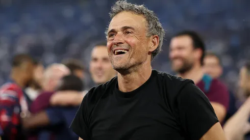 Luis Enrique, Head Coach of Paris Saint-Germain, acknowledges the fans as he celebrates victory with players of Paris Saint-Germain after the UEFA Champions League Final 2025 between Paris Saint-Germain and FC Internazionale Milano at Munich Football Arena on May 31, 2025 in Munich, Germany.