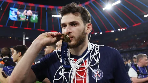 Khvicha Kvaratskhelia of Paris Saint-Germain kisses his Winners Medal after his team's victory, to secure Paris Saint-Germain's first ever UEFA Champions League title.