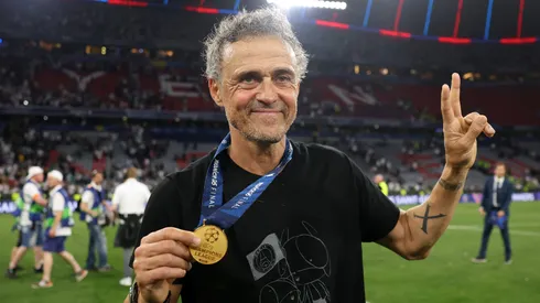 Luis Enrique, Head Coach of Paris Saint-Germain, poses for a photo with his winners medal, after their team's victory, to secure Paris Saint-Germain's first ever UEFA Champions League title.