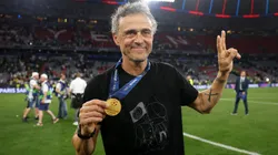 Luis Enrique, Head Coach of Paris Saint-Germain, poses for a photo with his winners medal, after their team's victory in the UEFA Champions League final.