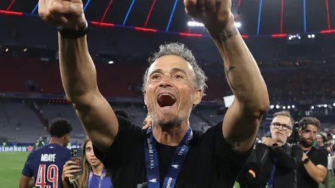 Luis Enrique, Head Coach of Paris Saint-Germain, acknowledges the fans as he celebrates after his team's victory, to secure Paris Saint-Germain's first ever UEFA Champions League title in the club's history