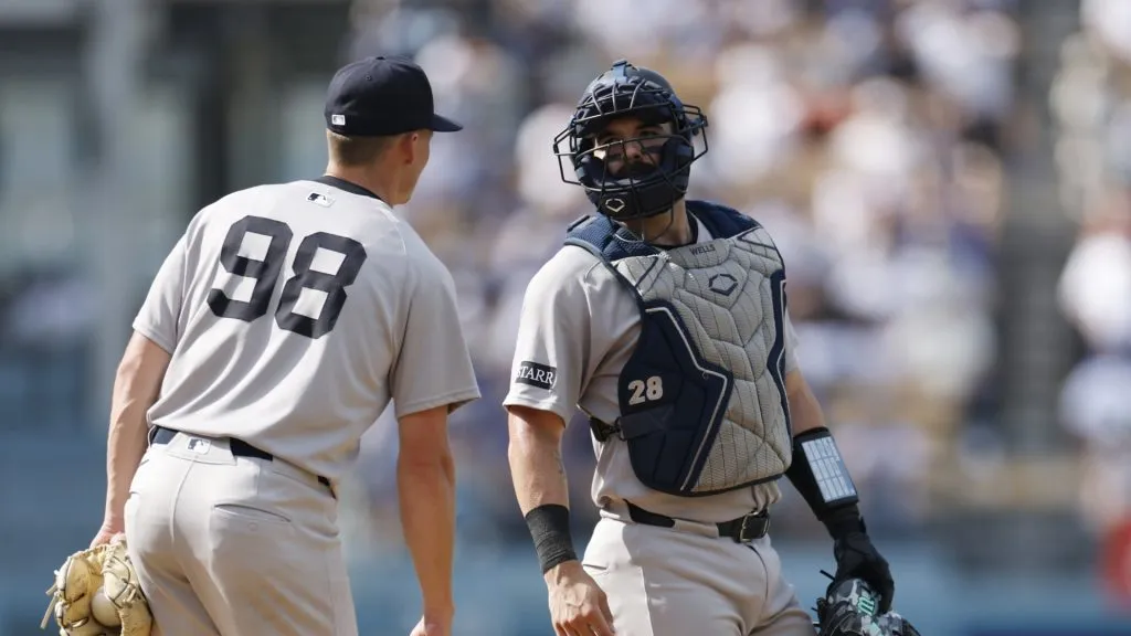 LOS ANGELES, CALIFORNIA – MAY 31: Will Warren #98 talks with Austin Wells #28 of the New York Yankees in the first inning against the Los Angeles Dodgers at Dodger Stadium on May 31, 2025 in Los Angeles, California. (Photo by Harry How/Getty Images)