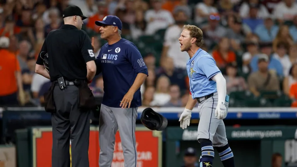 Taylor Walls #6 of the Tampa Bay Rays reacts after being ejected while manager Kevin Cash #16 of the Tampa Bay Rays argues with umpire Nic Lentz #59