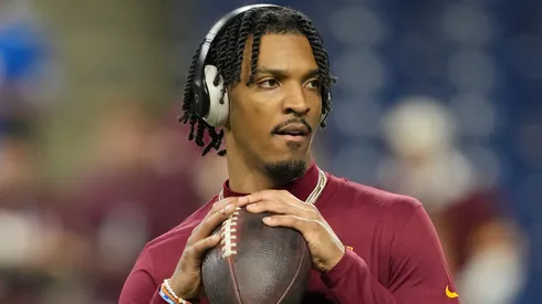 Jayden Daniels #5 of the Washington Commanders warms up prior to playing the Detroit Lions in the NFC Divisional Playoff at Ford Field on January 18, 2025 in Detroit, Michigan.