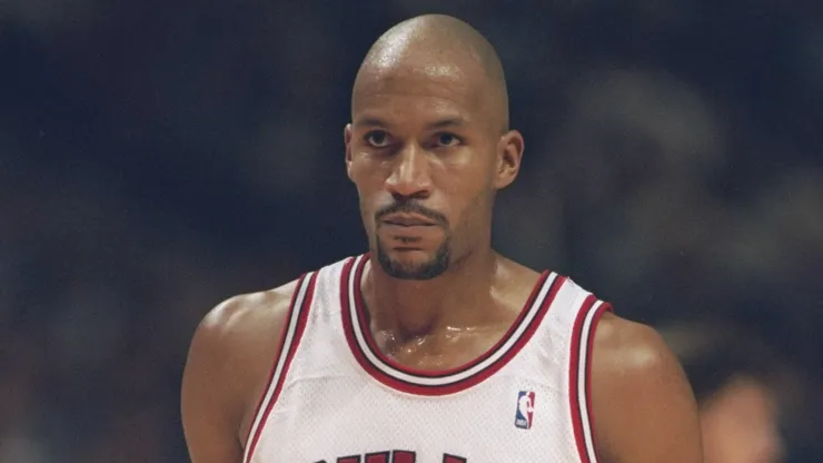 Guard Ron Harper of the Chicago Bulls stands on the court during a game against the Charlotte Hornets at the United Center in Chicago, Illinois. The Bulls won the game 89-83.