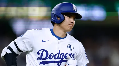 Shohei Ohtani #17 of the Los Angeles Dodgers runs to first after his solo home run, to trail 2-1 to the New York Mets, during the seventh inning at Dodger Stadium on June 02, 2025 in Los Angeles, California.