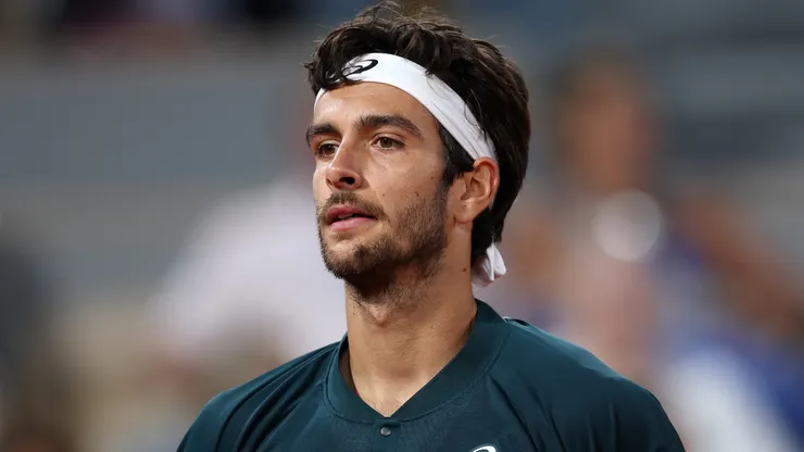Lorenzo Musetti of Italy looks on against Holger Rune of Denmark during the fourth round of Roland Garros.