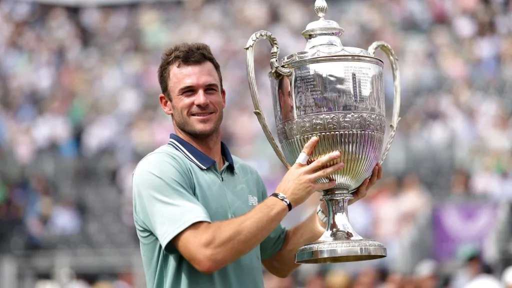 Tommy Paul of United States poses for a photo with the cinch Championships 2024 winners trophy following victory against Lorenzo Musetti of Italy in the Men’s Singles Final match. (Source: Clive Brunskill/Getty Images)