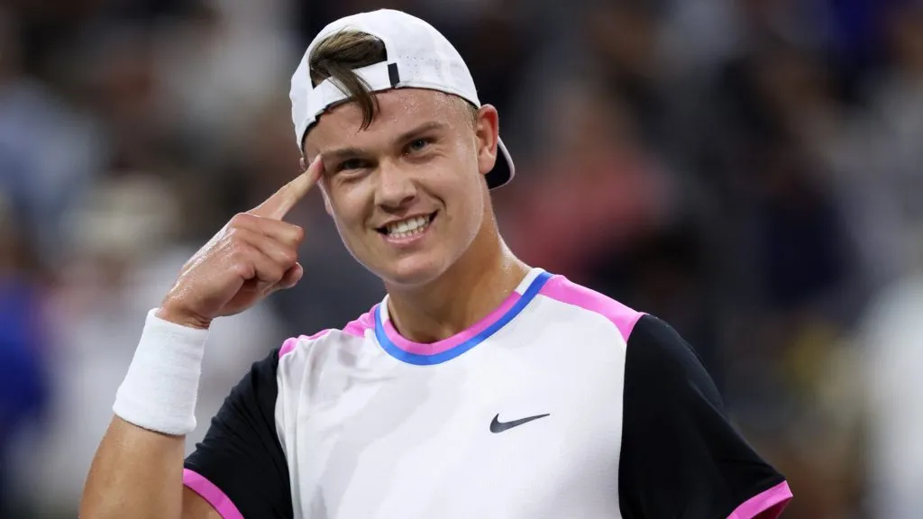 Holger Rune of Denmark celebrates to his team bench after his three set victory against Taylor Fritz of the United States in their fourth round match during the BNP Paribas Open in 2024. (Source: Clive Brunskill/Getty Images)