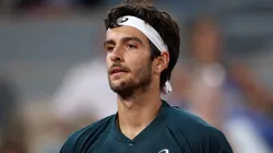Lorenzo Musetti of Italy looks on against Holger Rune of Denmark during the Men's Singles Fourth Round match on Day Eight of the 2025 French Open.