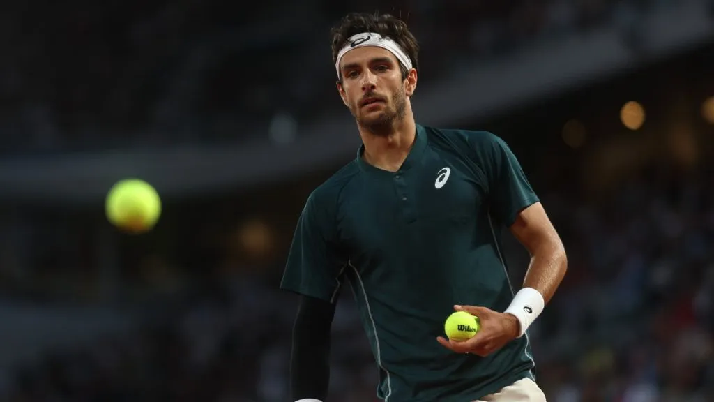 Lorenzo Musetti of Italy looks on as he prepares to serve against Holger Rune of Denmark during the Men’s Singles Fourth Round match on Day Eight of the 2025 French Open. (Source: Adam Pretty/Getty Images)