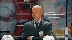 Assistant coach Dan Muse of the New York Rangers handles the bench during the game against the New Jersey Devils at Prudential Center on October 04, 2023 in Newark, New Jersey.