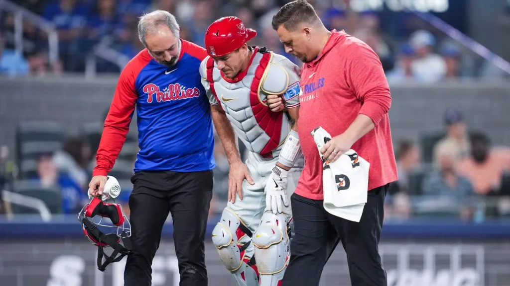 J.T. Realmuto #10 of the Philadelphia Phillies leaves the game with an injury against the Toronto Blue Jays during the ninth inning in their MLB game at the Rogers Centre on June 4, 2025 in Toronto, Ontario, Canada. (Photo by Mark Blinch/Getty Images)