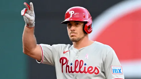 J.T. Realmuto #10 of the Philadelphia Phillies celebrates a double during the second inning against the Cleveland Guardians at Progressive Field on May 11, 2025.