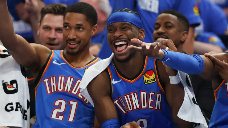 Aaron Wiggins and Shai Gilgeous-Alexander react on the bench against the Minnesota Timberwolves.