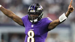 Quarterback Lamar Jackson #8 of the Baltimore Ravens celebrates throwing a touchdown pass against the Dallas Cowboys during the second quarter at AT&T Stadium on September 22, 2024 in Arlington, Texas.