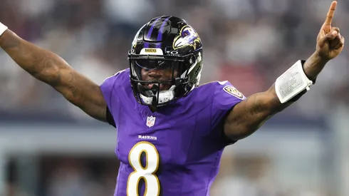 Quarterback Lamar Jackson #8 of the Baltimore Ravens celebrates throwing a touchdown pass against the Dallas Cowboys during the second quarter at AT&T Stadium on September 22, 2024 in Arlington, Texas.