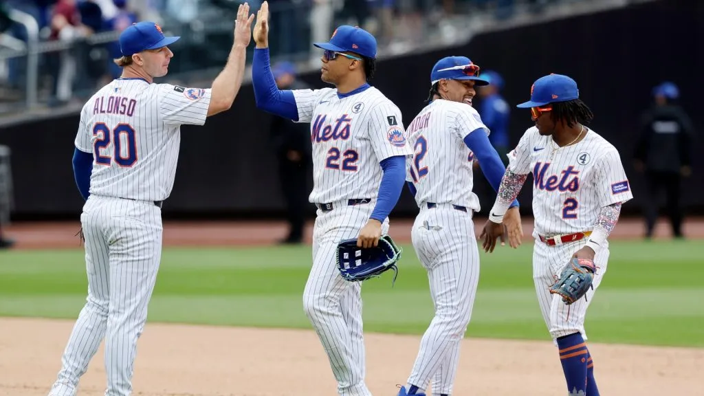 Pete Alonso #20, Juan Soto #22, Francisco Lindor #12 and Luisangel Acuna #2 of the New York Mets celebrate after defeating the Colorado Rockies at Citi Field on June 01, 2025 in New York City. (Photo by Jim McIsaac/Getty Images)
