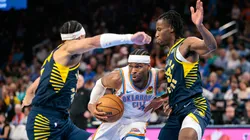 Shai Gilgeous-Alexander #2 of the Oklahoma City Thunder drives to the basket around Myles Turner #33 of the Indiana Pacers during the third quarter Paycom Center on March 29, 2025 in Oklahoma City, Oklahoma.