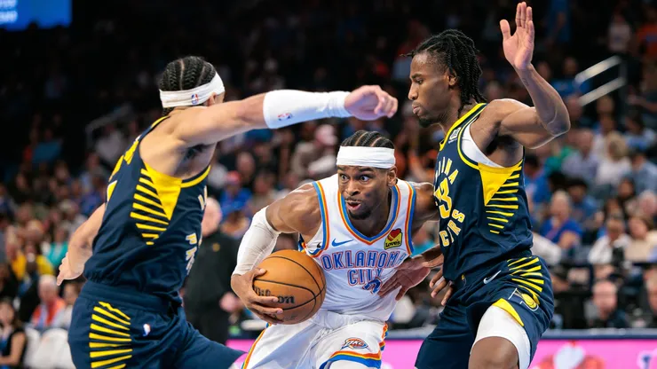 Shai Gilgeous-Alexander #2 of the Oklahoma City Thunder drives to the basket around Myles Turner #33 of the Indiana Pacers during the third quarter Paycom Center on March 29, 2025 in Oklahoma City, Oklahoma.