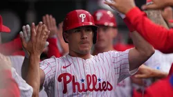 J.T. Realmuto #10 of the Philadelphia Phillies high-fives teammates after hitting a two-run home run in the bottom of the first inning against the St. Louis Cardinals during game two of a doubleheader at Citizens Bank Park on May 14, 2025 in Philadelphia, Pennsylvania.