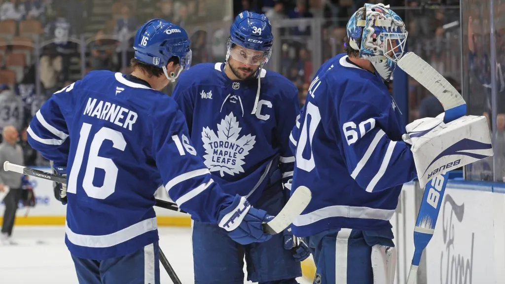 A dejected trio of Toronto Maple Leafs Mitchell Marner #16, Auston Matthews #34, and Joseph Woll #60 leave the ice for the last time this season after losing to the Florida Panthers in Game Seven of the Second Round of the 2025 Stanley Cup Playoffs at Scotiabank Arena on May 18, 2025. (Photo by Claus Andersen/Getty Images)