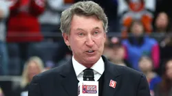 Former NHL player Wayne Gretzky speaks during the celebration after Alex Ovechkin #8 of the Washington Capitals scores his 895th career goal during the second period against the New York Islanders at UBS Arena on April 06, 2025.