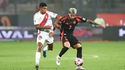 Luis Diaz of Colombia competes for the ball against Wilder Cartagena of Peru in September 2024