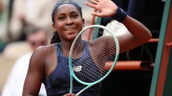 Coco Gauff celebrates after winning at the Roland Garros