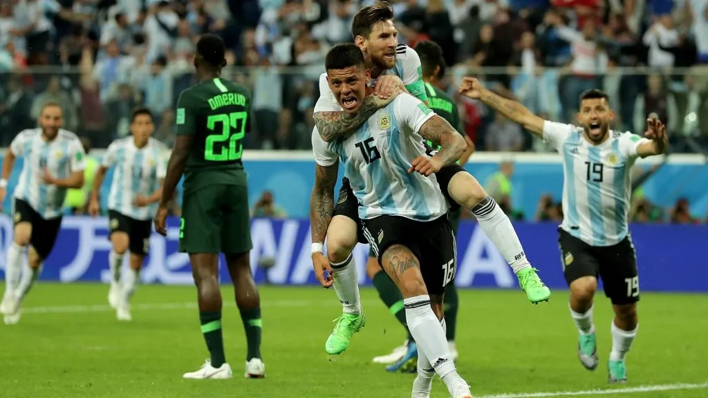 Marcos Rojo and Lionel Messi celebrate a crucial goal for Argentina vs Nigeria at 2018 FIFA World Cup
