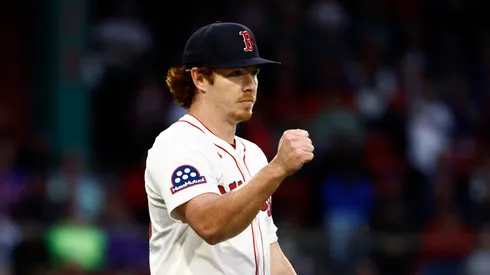 Pitcher Hunter Dobbins #73 of the Boston Red Sox reacts after a double play against the New York Mets ended the third inning at Fenway Park on May 19, 2025 in Boston, Massachusetts.