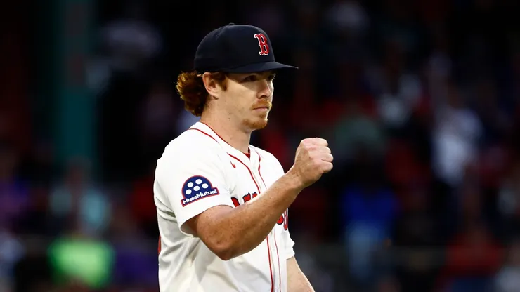 Pitcher Hunter Dobbins #73 of the Boston Red Sox reacts after a double play against the New York Mets ended the third inning at Fenway Park on May 19, 2025 in Boston, Massachusetts.