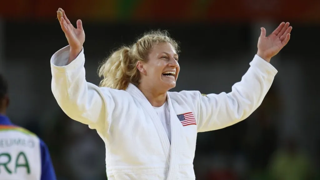 Kayla Harrison celebrating a win in the Olympics