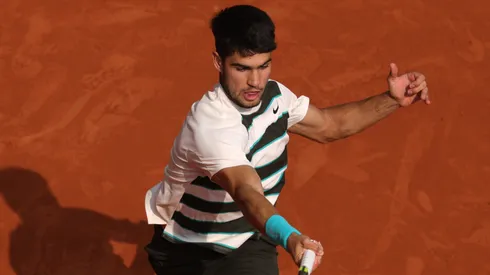 Carlos Alcaraz of Spain plays a forehand against Jannik Sinner of Italy during the Men's Singles Final match on Day Fifteen of the 2025 French Open at Roland Garros on June 08, 2025 in Paris, France.