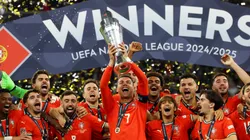 Cristiano Ronaldo of Portugal lifts the UEFA Nations League trophy after his team's victory in the UEFA Nations League 2025 final match between Portugal and Spain at Munich Football Arena on June 08, 2025 in Munich, Germany.
