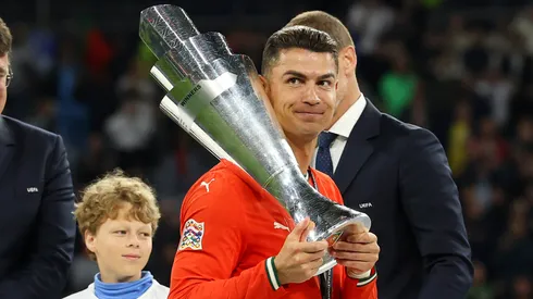 Cristiano Ronaldo of Portugal lifts the UEFA Nations League trophy after his team's victory in during the UEFA Nations League 2025 final match between Portugal and Spain at Munich Football Arena on June 08, 2025 in Munich, Germany.