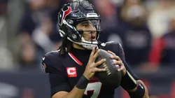 C.J. Stroud #7 of the Houston Texans drops back to pass against the Los Angeles Chargers in the first half during the AFC Wild Card Playoffs at NRG Stadium on January 11, 2025 in Houston, Texas.