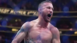 Justin Gaethje celebrates beating Dustin Poirier during their BMF Title Lightweight fight at UFC 291 at the Delta Center July 29, 2023 at the in Salt Lake City, Utah.