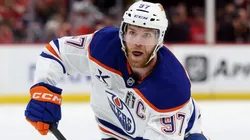 Connor McDavid #97 of the Edmonton Oilers skates with the puck against the Florida Panthers during the first period in Game Three of the 2025 Stanley Cup Final at Amerant Bank Arena on June 09, 2025 in Sunrise, Florida.