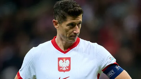 Robert Lewandowski of Poland looks on.