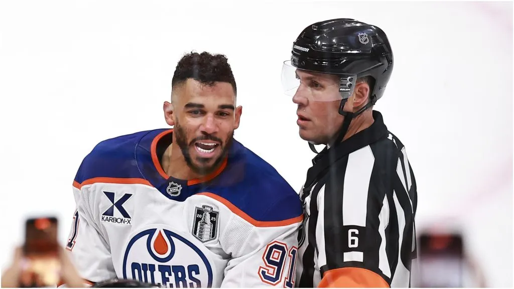 Evander Kane #91 of the Edmonton Oilers talks with referee Francis Charron #6 during the first period against the Florida Panthers in Game Three of the 2025 Stanley Cup Final at Amerant Bank Arena on June 09, 2025 in Sunrise, Florida.