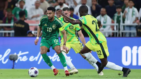 Salem Aldawsari of Saudi Arabia controls the ball whilst under pressure from Jason Geria of Australia during the 2026 FIFA World Cup Round Three AFC Asian Qualifier