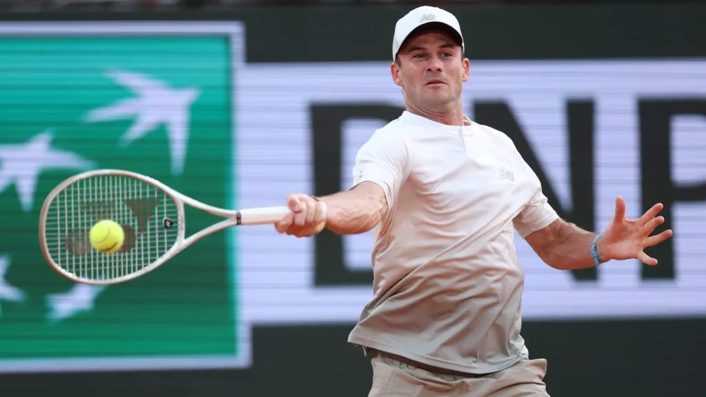 Tommy Paul of United States plays a forehand against Carlos Alcaraz of Spain during the quarterfinal of Roland Garros. (Julian Finney/Getty Images)